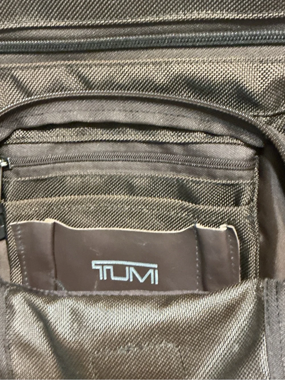 Tumi Brown Men's Backpack with Silver Hardware